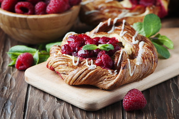 Sweet homemade cake with fresh berry and mint