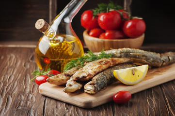 Traditional russian fish smelt on the wooden table