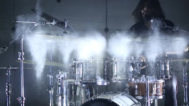 drummer hits the drums, slow motion