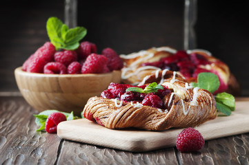Sweet homemade cake with fresh berry and mint