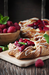 Sweet homemade cake with fresh berry and mint
