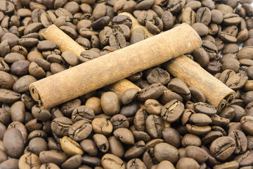 coffee beans, cinnamon on a white background
