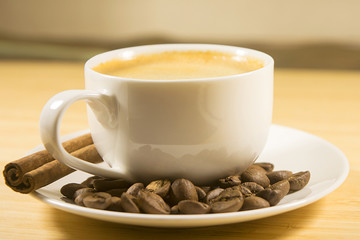 cinnamon cup of coffee beans
