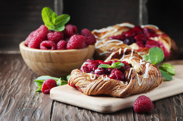 Sweet homemade cake with fresh berry and mint