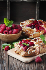 Sweet homemade cake with fresh berry and mint