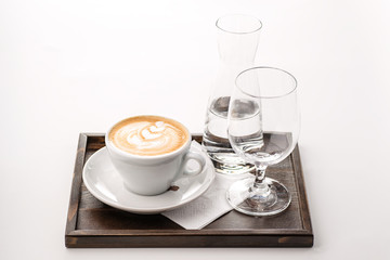 exclusive art coffee set with glass of water, hot drink product photography, cappuccino, espresso isolated on white background