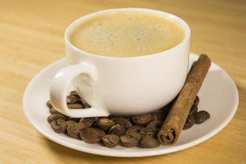 cinnamon cup of coffee beans
