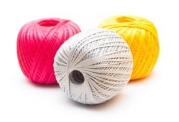 Balls of knitting yarn on white background