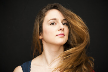 Fototapeta premium Beautiful Woman Shaking Her Hair