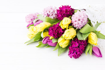 Bouquet of spring flowers. Tulips and hyacinths. Copy space