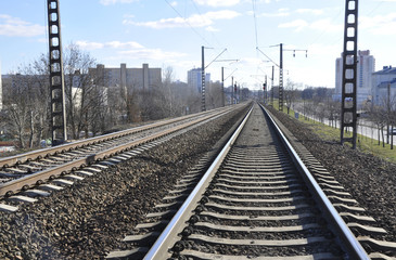 Fototapeta na wymiar Железная дорога уходит вдаль.The railroad goes into the distance.