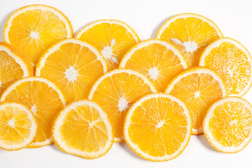 orange fruit in section in white water