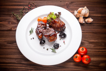 Delicious barbecued ribs seasoned with a spices and fresh herbs
