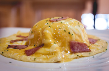 Omelet with Ham on a white dish