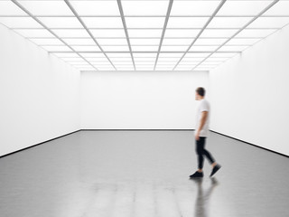 Fototapeta na wymiar Photo of student in modern gallery looking at the empty canvas. Blank mockup, motion blur 