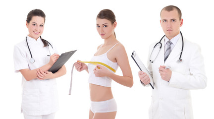 plastic surgery and breast augmentation concept - two doctors an