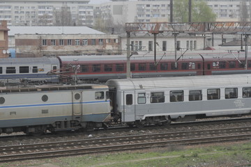 Bucharest, Romania, March 13, 2016: Passenger trains are seen the switch yard of Gara de Nord main railway station.