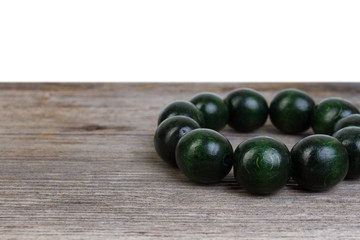 wooden bracelet on wooden background