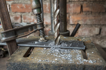 drilling a metal piece