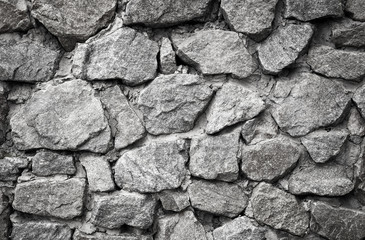 Stone rocks wall background. Black and white background of stone