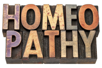 homeopathy word in wood type