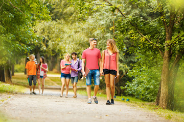 Fototapeta premium group of happy students in a Park on a Sunny day..
