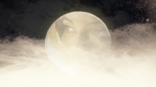 The mysterious face of a vintage girl in a full moon on a cloudy night. Looking left.