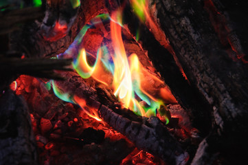 Unusual green flames from the fire caught in copper sulphate