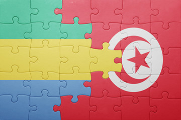 puzzle with the national flag of tunisia and gabon