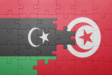 puzzle with the national flag of tunisia and libya