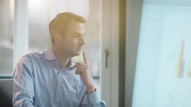 business man researching, looking surprized