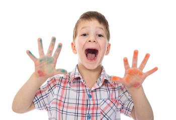shouting boy with colorful painted fingers spread