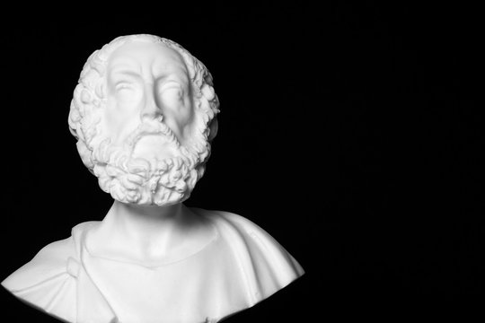 White marble bust of the greek poet Homer isolated on black