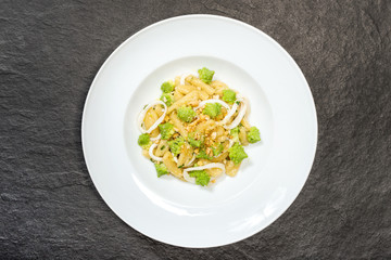 cavatelli with broccoli, squid and bagels