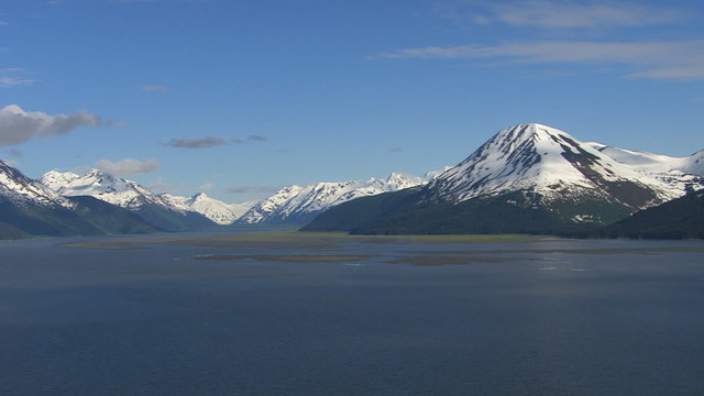 Panning shot of lake and mountains in Alaska