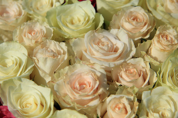 Roses in different shades of pink, bridal arrangement