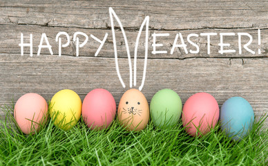Easter eggs and cute bunny. Funny decoration Happy Easter