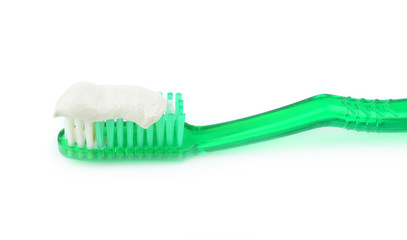  toothbrush with toothpaste on white background