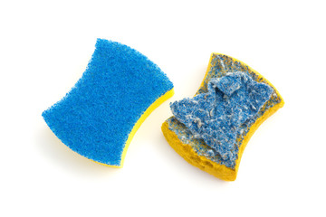 top view new & old double-side cleaning sponge on a white background