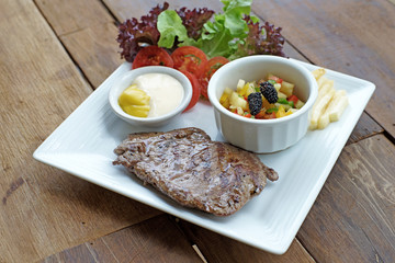 grilled pork steak with french fries