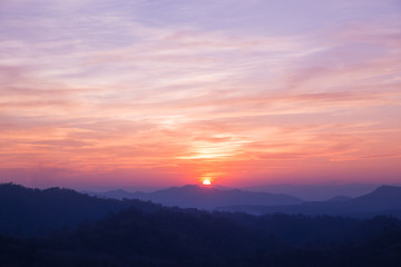 Colorful sunset on top of thailand mountain
