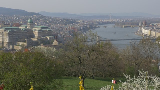 Royal Castle Parliament building and Danube river scene from Citadela hill sight 4K 2160p UltraHD tilting footage - Buda side of Hungarian capital by the day 4K 3840X2160 UHD video 