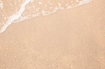 Soft wave of the sea on the sandy beach