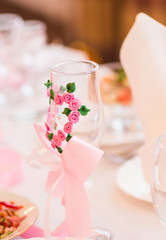 Close-up of wedding glasses decorated