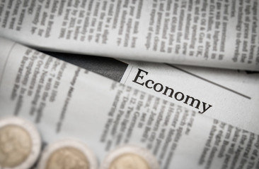 Obraz premium economy issue on newspaper