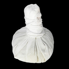 Obraz premium compress for spa and massage on black background