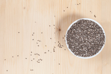 Obraz na płótnie Canvas Nutritious chia seeds in bowl