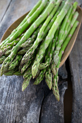 asparagus on wooden surface