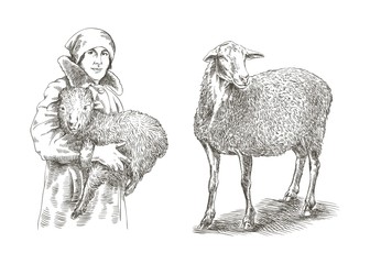 Female farmer holding a lamb in his hands