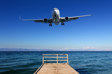 Landing in paradise - airplane approaching ground